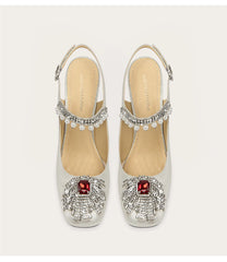 Square toe pumps with pearl rhinestone tassel detail