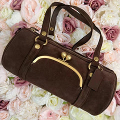 Brown Boston handbag with smooth lining and interior zipper pocket