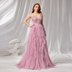 Pink A-line evening gown with V-neck beaded bodice on model