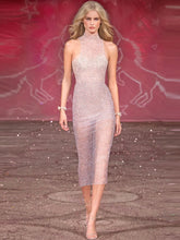 Pink crystal mesh midi dress styled for nightclub parties