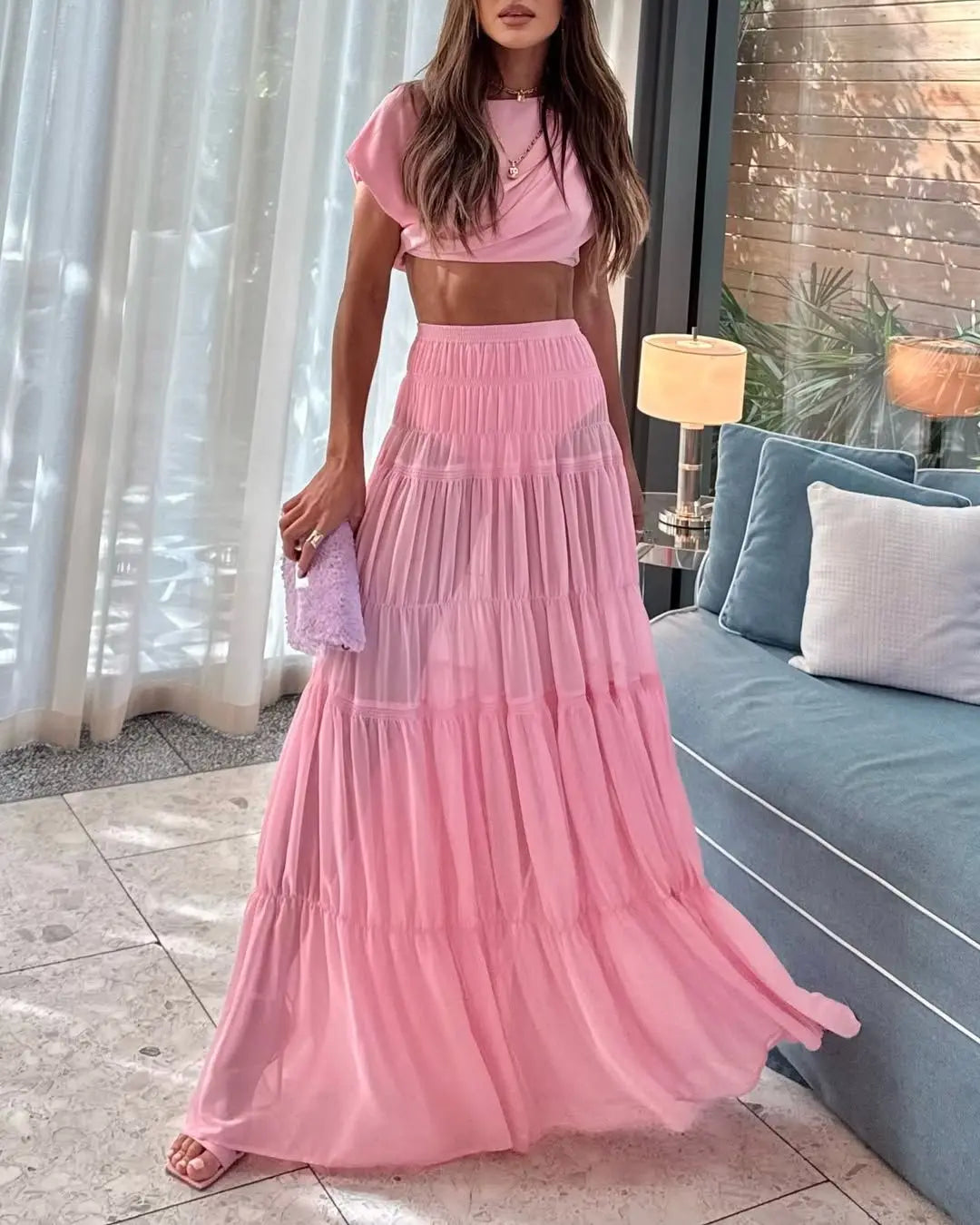 Pink floral crop top and maxi skirt set styled for spring picnics and vacation