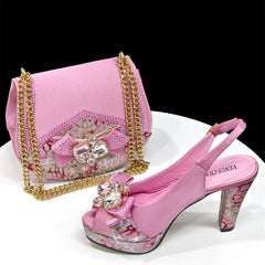 Pink shoe and handbag set with floral rhinestone bow and gold chain handle