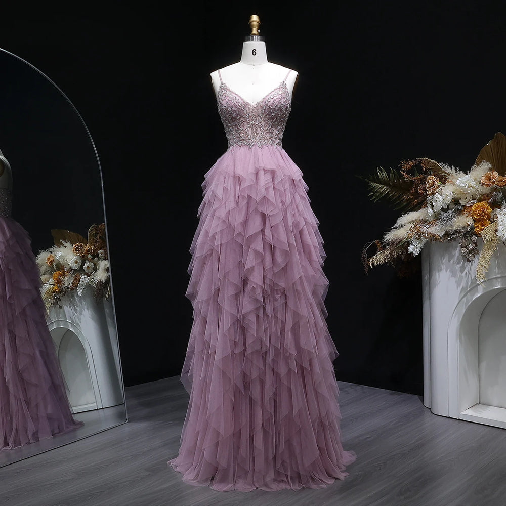 Floor-length formal dress with tiered ruffle skirt and embellished top