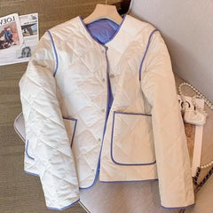 A close-up of the elegant plaid panel and the sleek collar.