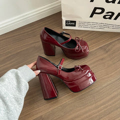Wine red platform Mary Jane block heel shoes worn indoors