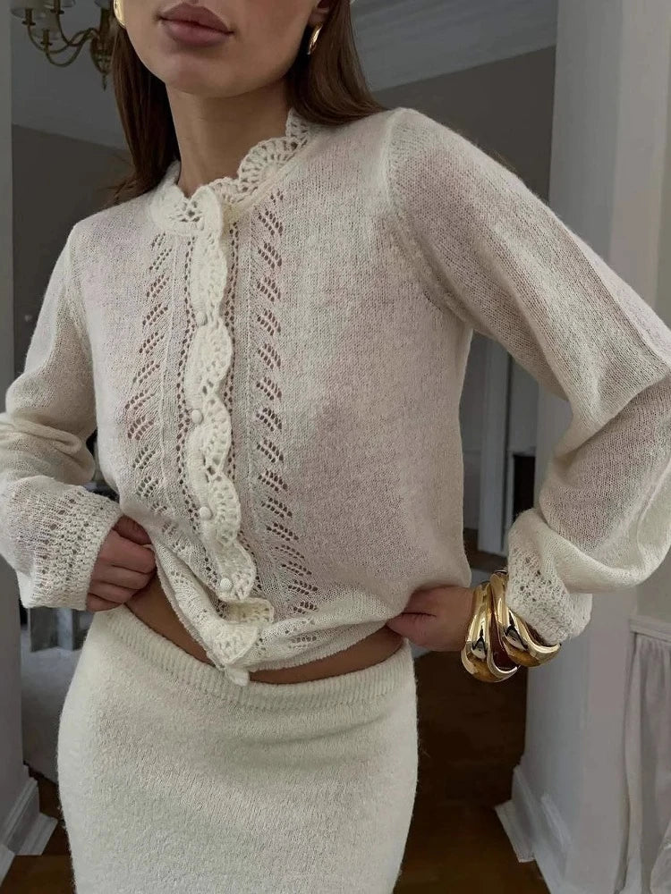 Close view highlighting the pleated knit texture and open-stitch construction across the front panel.