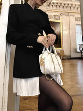 Pleated patchwork mini blazer dress styled for modern women’s workwear