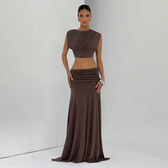 Front view of a pleated crop top and ankle-length skirt matching set