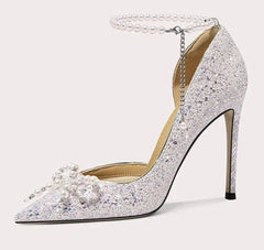 Elegant stiletto bridal shoes with pearl bow detail