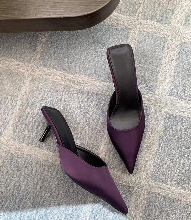 High heel summer mule slides in purple styled indoors
