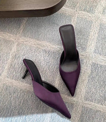 High heel summer mule slides in purple styled indoors