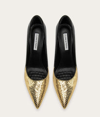 Pair of black and gold pointed-toe shoes on a white background