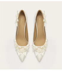 Elegant high heel pumps featuring handmade flower details