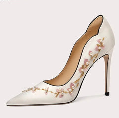 Elegant stiletto heels with silk and pearl detailing