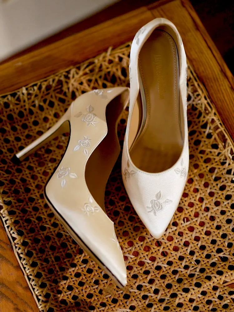 Elegant silk stiletto heels with embroidery detail