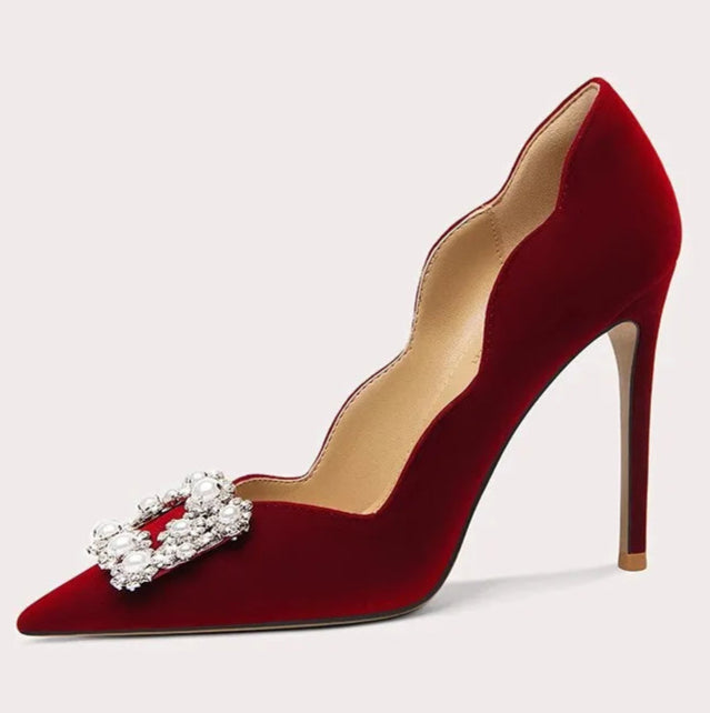 Pointed toe suede pumps with rhinestone accents