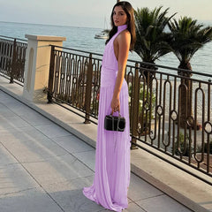 Purple folded maxi dress perfect for resort evenings and weddings