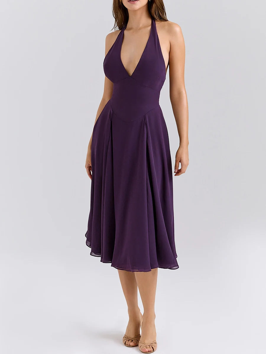 Purple halter neck midi dress styled for modern summer events