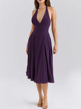 Purple halter neck midi dress styled for modern summer events