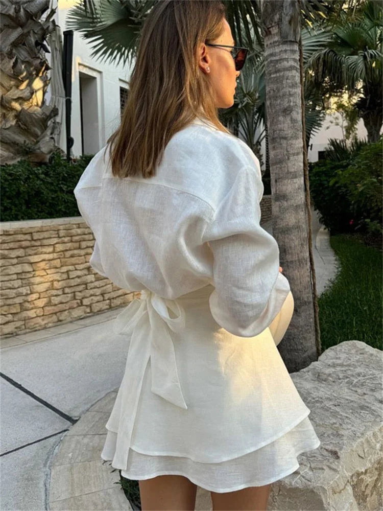 Capsule wardrobe outfit idea featuring white shirt and skirt set