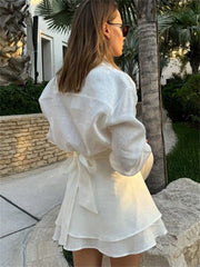 Capsule wardrobe outfit idea featuring white shirt and skirt set