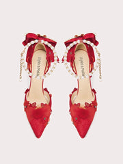 Red applique bow party sandals styled for bold celebrations and parties