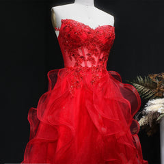 Close-up of the bodice showing appliqué texture and V-neckline