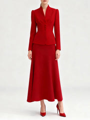 Elegant skirt suit set shown front view with structured blazer and flowing skirt