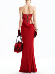 Front view emphasizing the draped waist overlay and smooth fitted skirt, creating a sculpted line from bust to hem.
