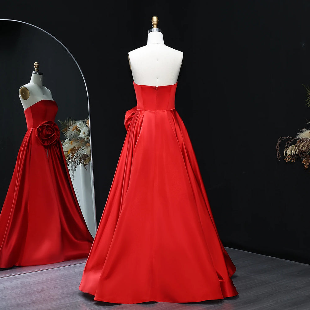 Floor-length formal dress with sculpted bodice and sweeping satin skirt