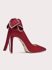 Red silk bow pearl heels designed for statement party style