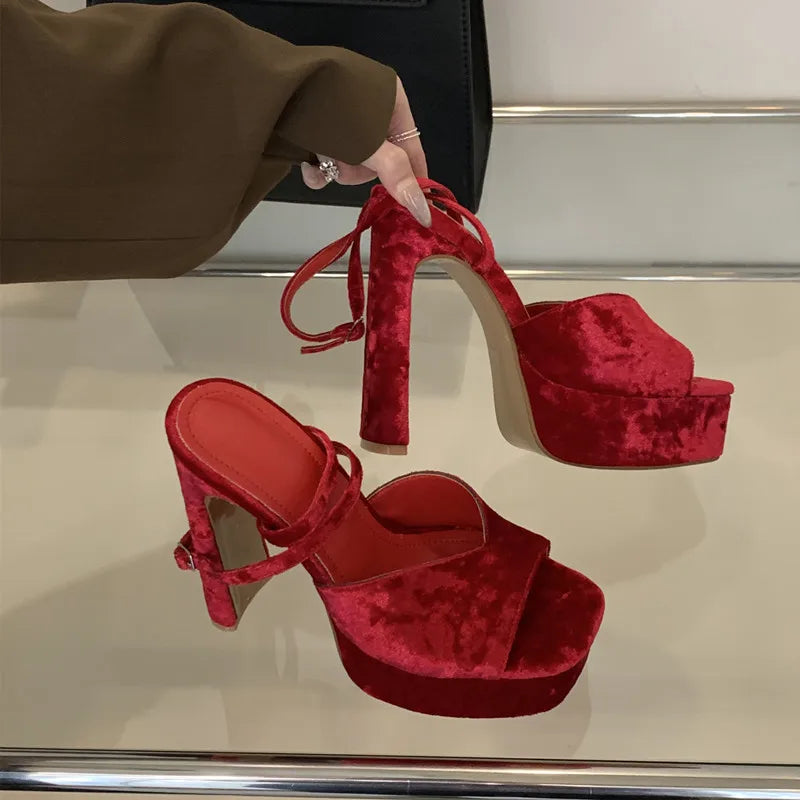 Red velvet platform wedges with buckle strap detail
