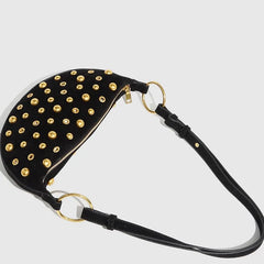 Vintage-inspired black underarm purse with gold embellishments
