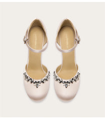 Suede sandals with rhinestone bow and stiletto heel