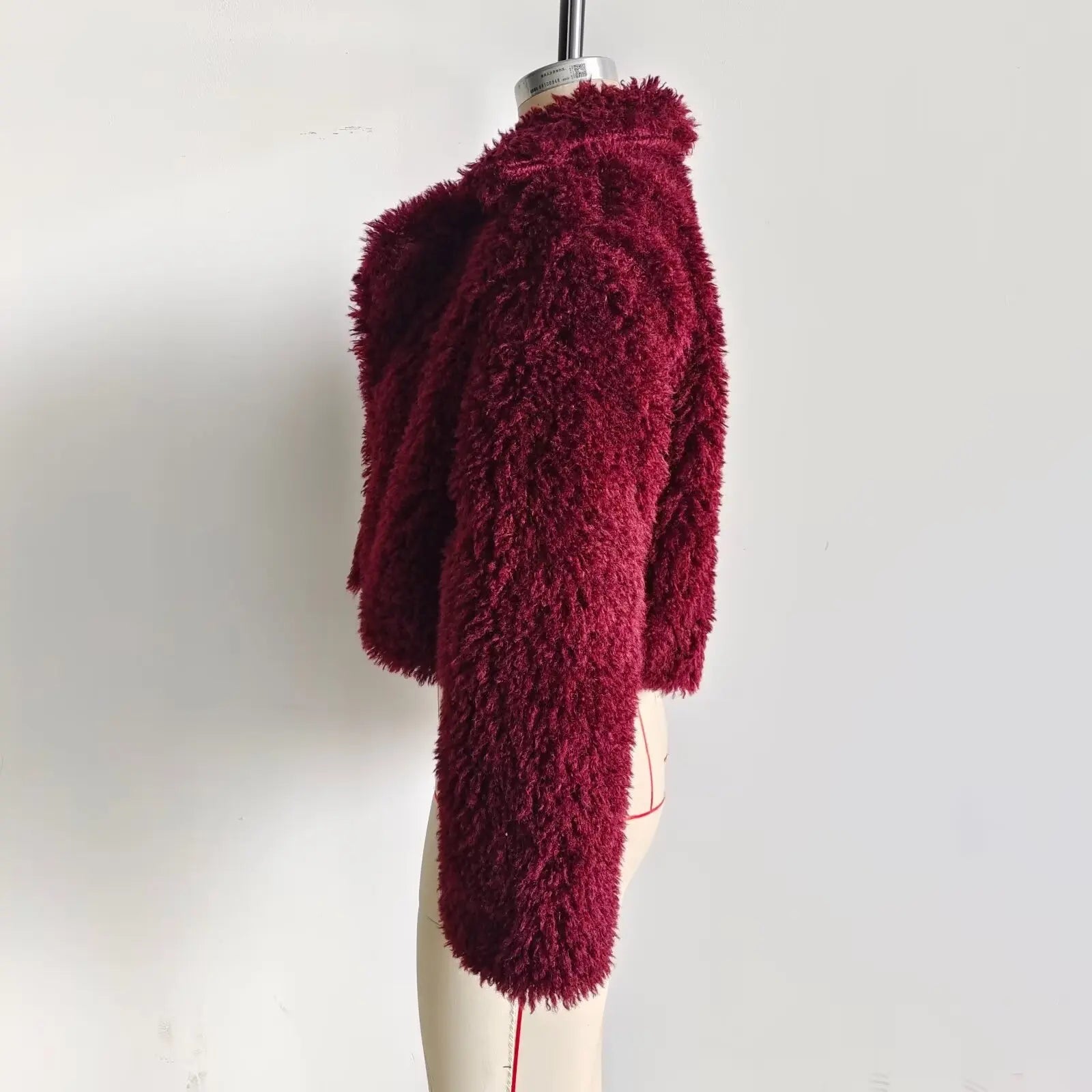 Rich burgundy statement furry coat for cold weather