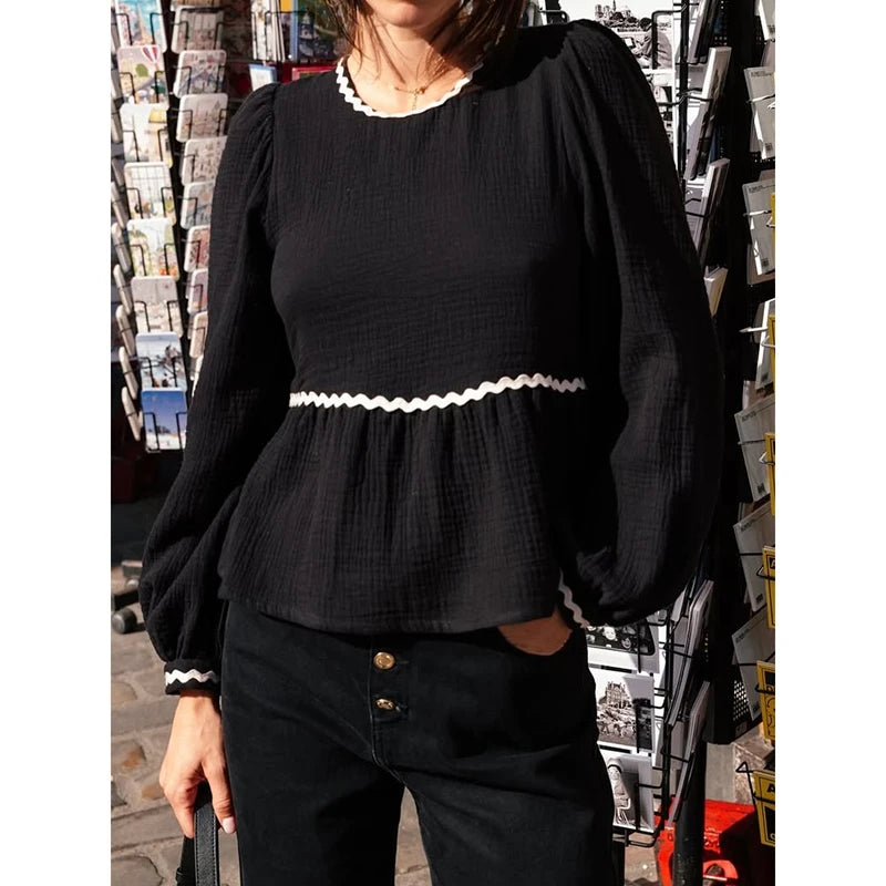 Ruffle hem slim top paired with denim shorts for relaxed weekend mood