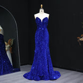Full-length view of a backless mermaid gown with an all-over shimmer
