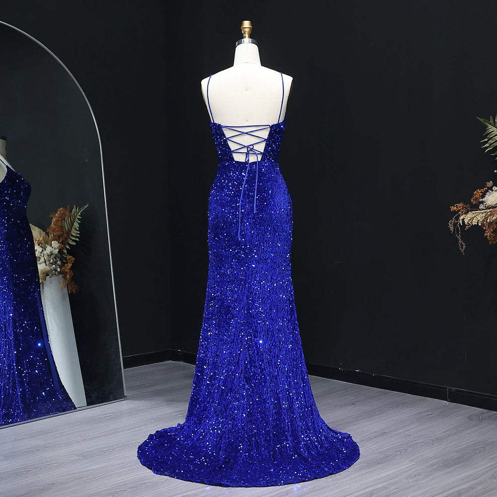 Close-up of the V-neck bodice showing sequin texture on tulle