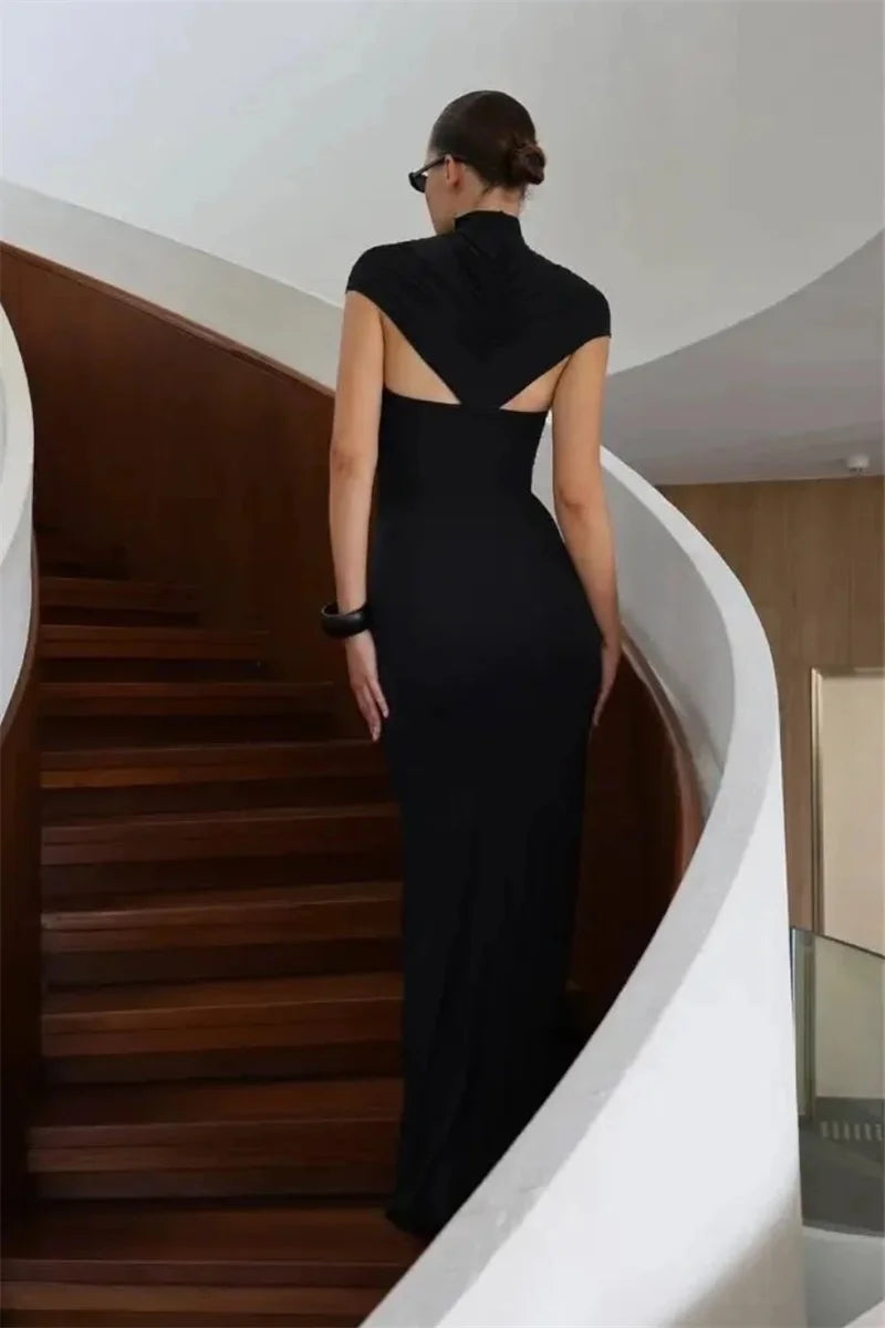 Back view of a slim floor-length gown with smooth drape