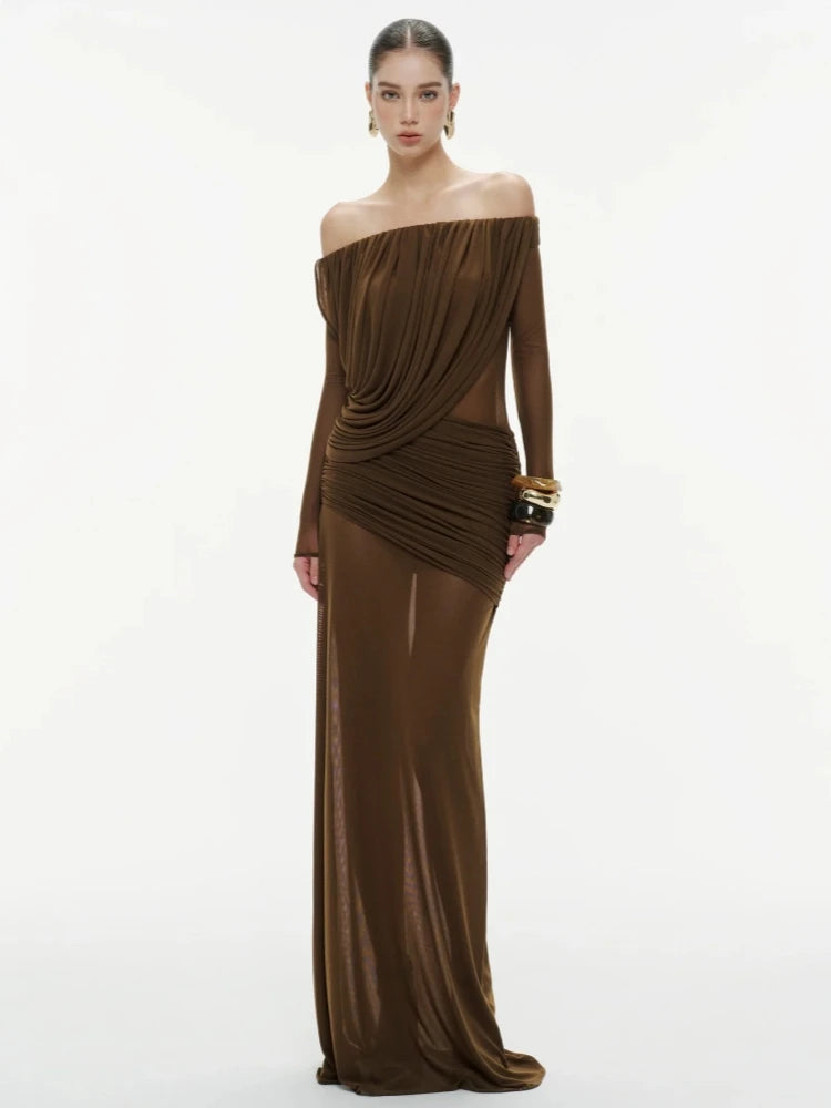 Maxi length fitted party gown with mesh finish and gathered drape