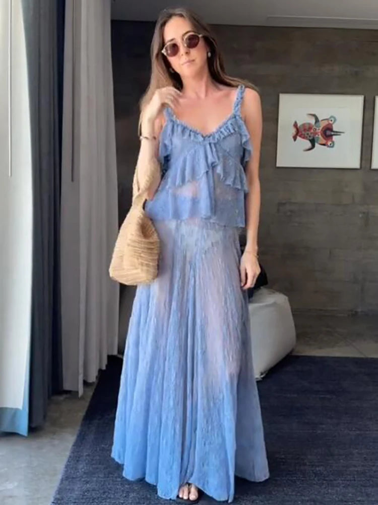 A woman wearing a two-piece skirt set with lace and ruffles.