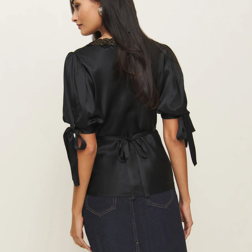 Satin V-neck top styled with puff sleeves and slim fit