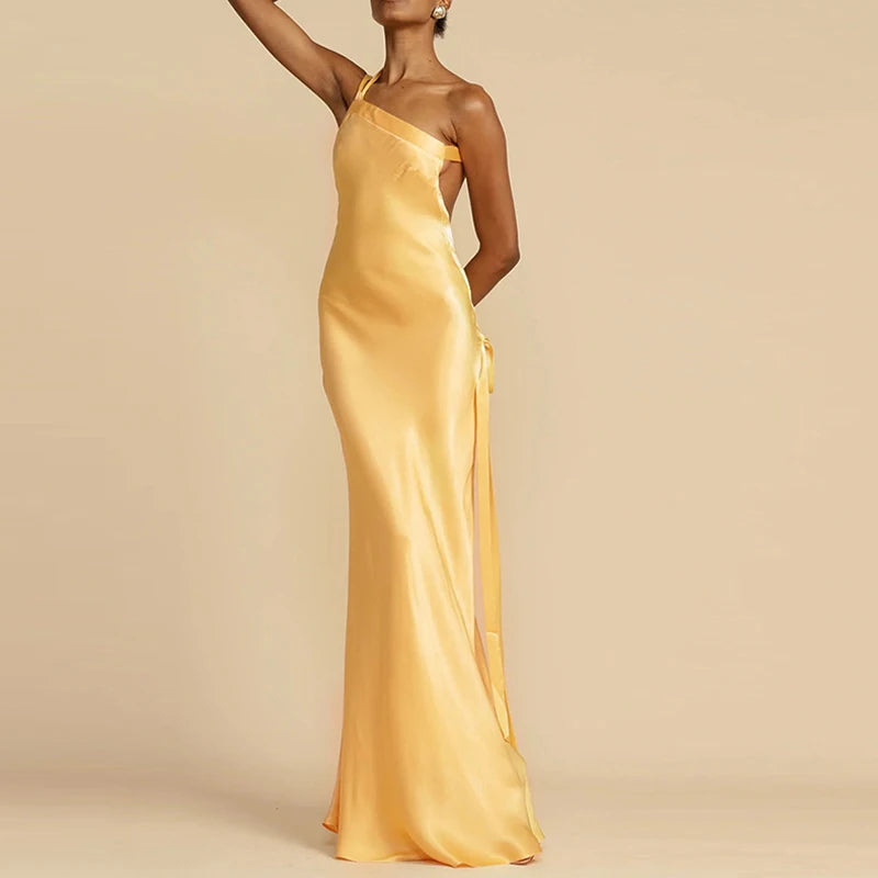 Front view of satin one-shoulder gown in gold for formal occasions
