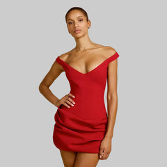 Front view highlighting the off-shoulder V neckline and fitted bodice, with a sleek mini length designed for parties and dinners.