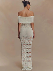 Woman wearing a bodycon knit gown, perfect for winter parties and events, on a beige background