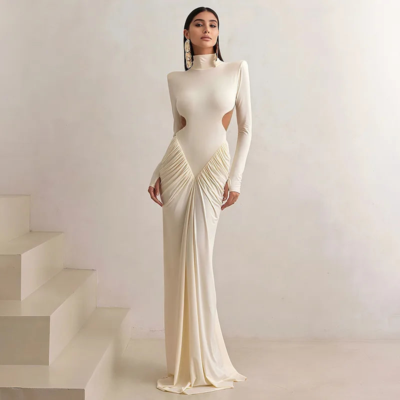 Sculpted white maxi dress with long sleeves and side cutout detail