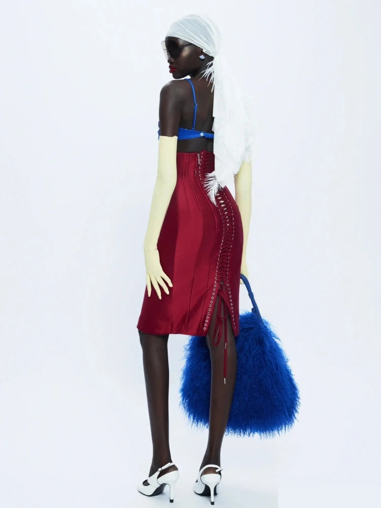 Sculptural applique and ribbon statement dress for creative occasions