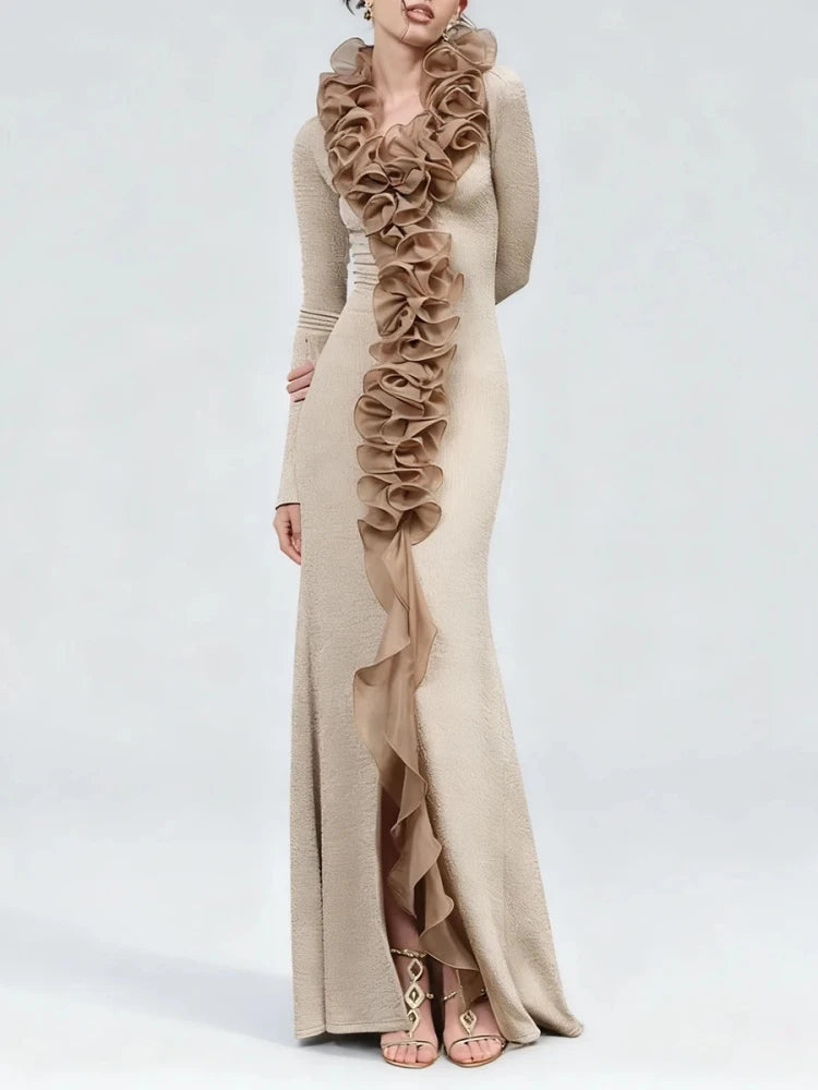 Full silhouette view showing the slim fit, ankle length, and sculptural drape of the gown