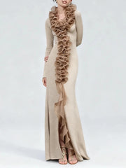 Full silhouette view showing the slim fit, ankle length, and sculptural drape of the gown