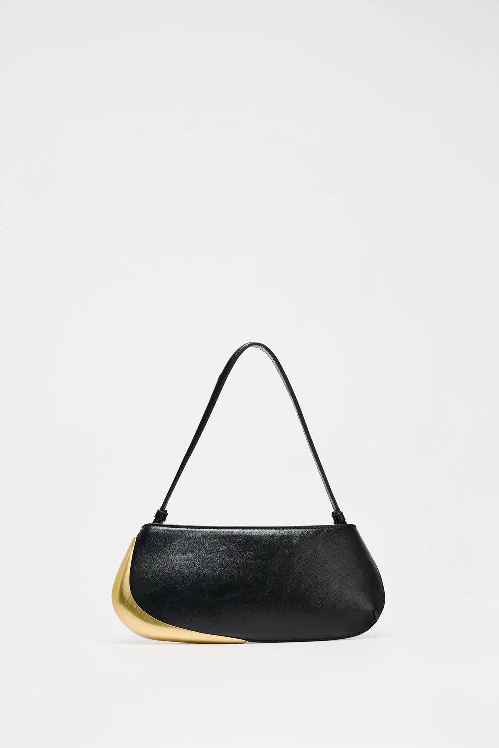 Sculptural half moon vegan bag styled for gifting and every day